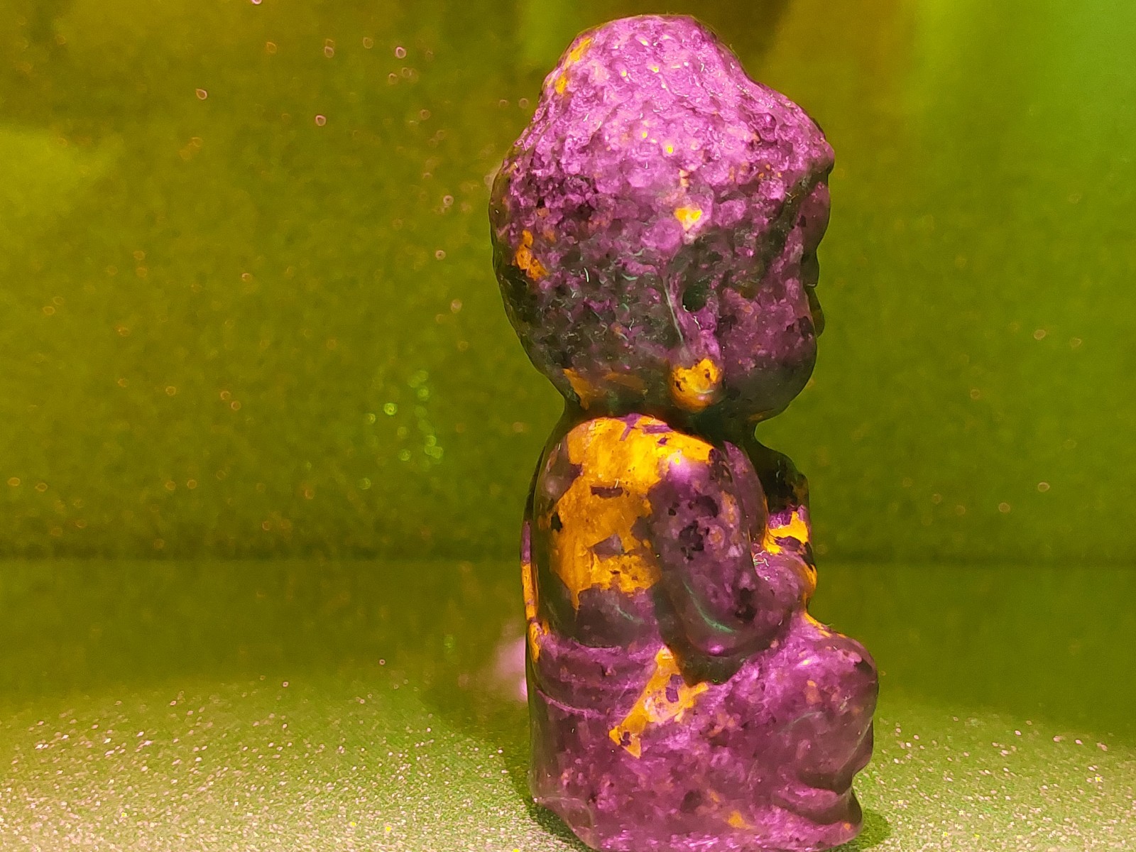 Yooperlite Buddha Carving 134.7g 8cm UV Reactive – Glows Orange Under Light