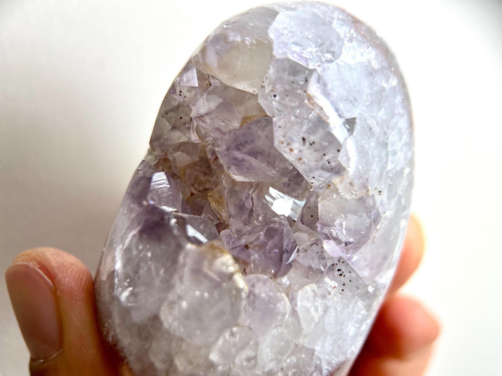 Natural cute light purple amethyst geode crystal, hematite inclusion & rainbows