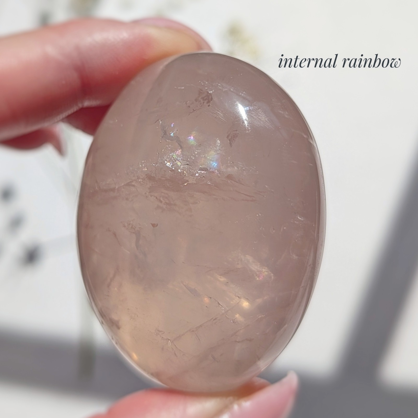2″ translucent rose quartz palmstone with rainbow and asterism, star rose quartz