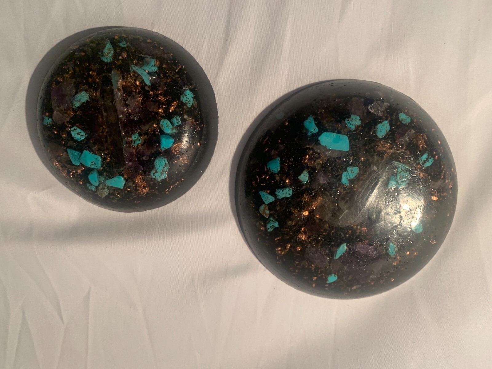 Crystal and stone orgone tower buster that is round in shape set of 2 handmade