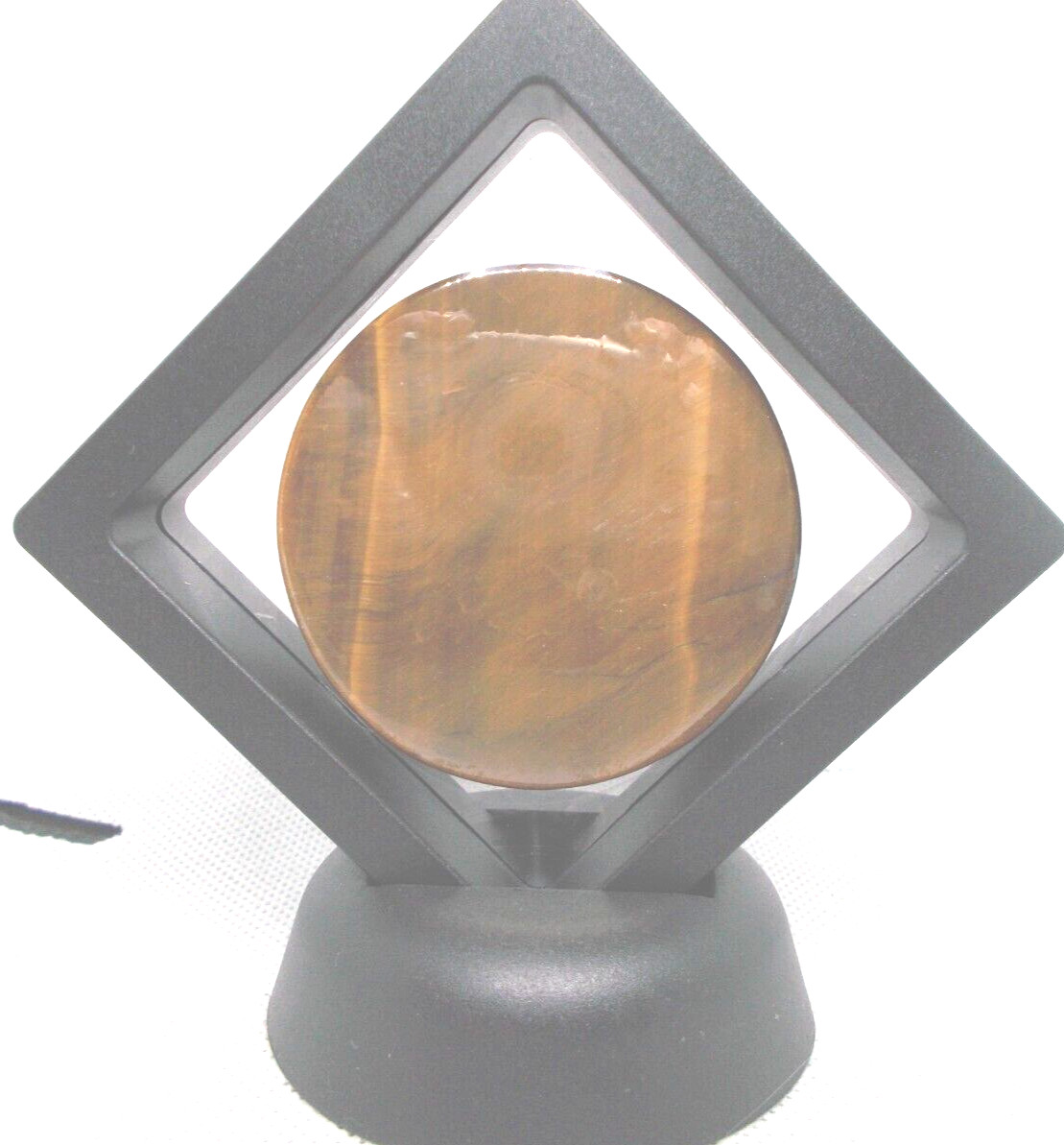 Tiger’s Eye carved lions face 2″ in display frame