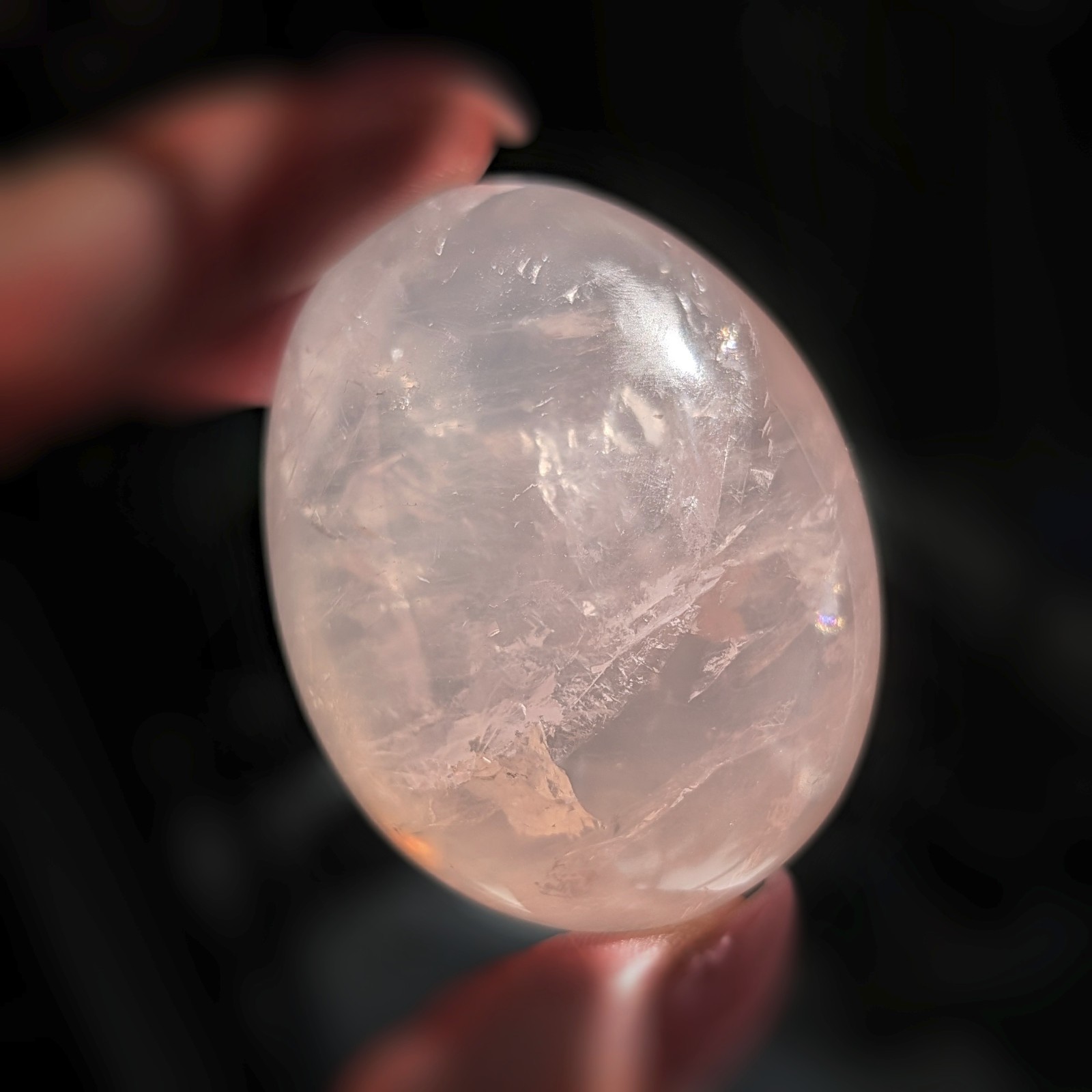 2″ translucent rose quartz palmstone with rainbow and asterism, star rose quartz