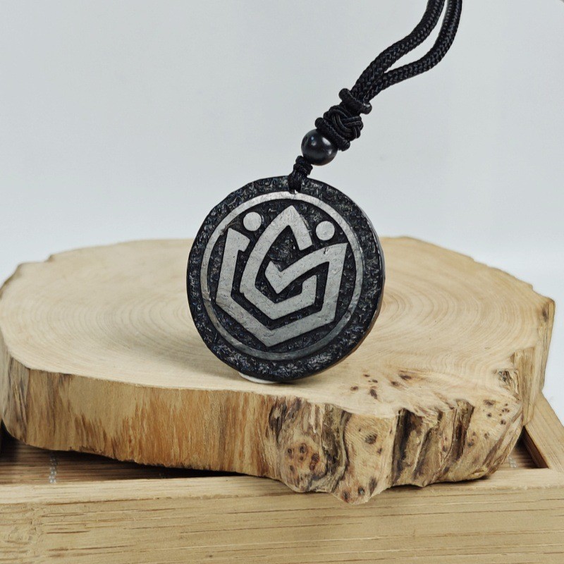 Shungite black natural stone circular pendant carved with retro totem pendant