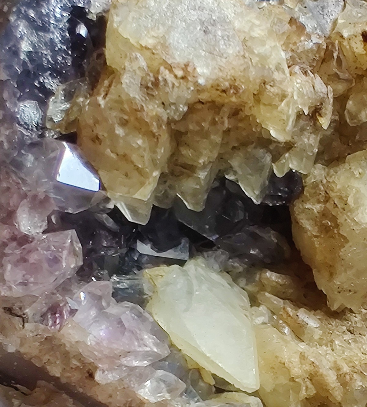 Excellent Amethyst and Calcite crystal Agate Geode, Fluorescent. 312 grams.