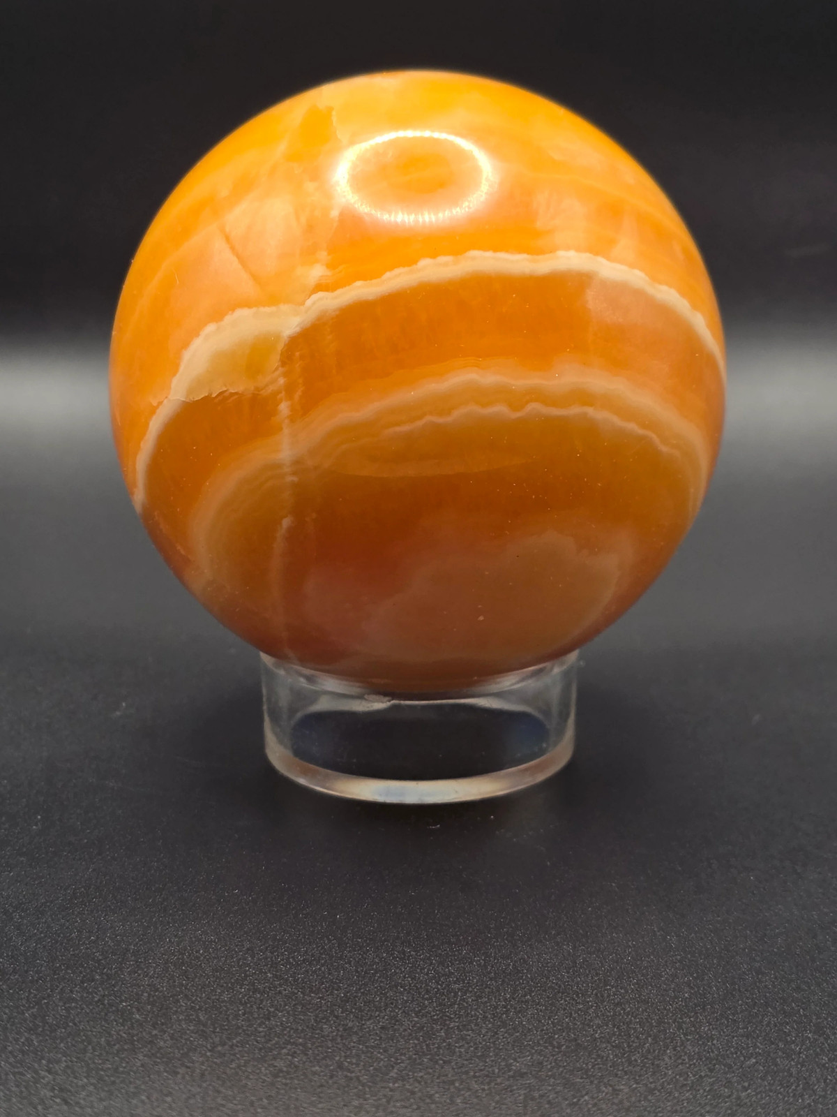 Large orange calcite sphere! 82.6mm, 3.2 inches, 1.12 pounds