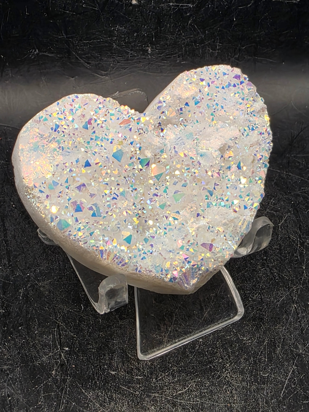 White pearl aura quartz heart! 3.4 ounces, 2.5 inches wide, 2.1″ tall