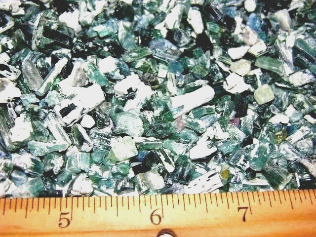 Tourmaline crystal blue green all natural with matrix 100 carat lots