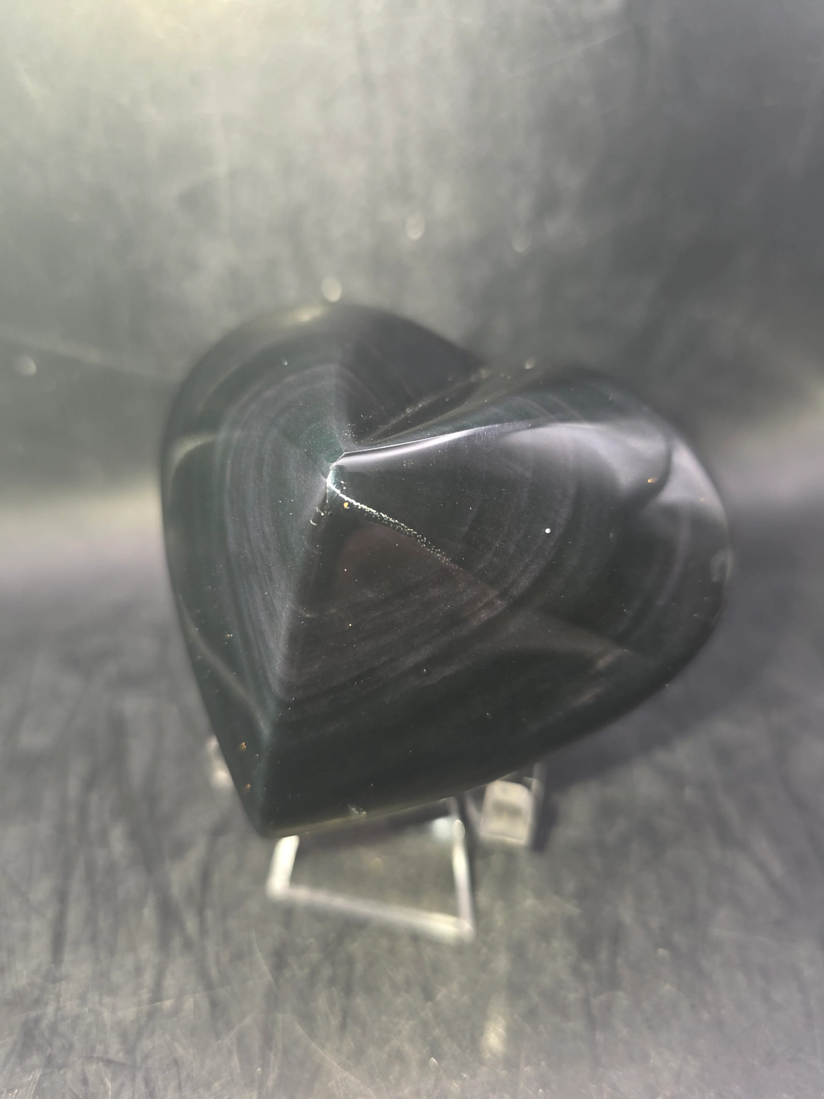 Rainbow obsidian heart! 10 ounces, 3 inches wide, 2.8″ tall