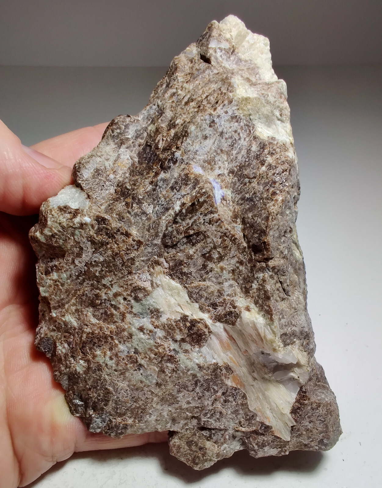 Wollastonite, Garnet, Diopside rock, fluorescent. Sweden. 734 grams.