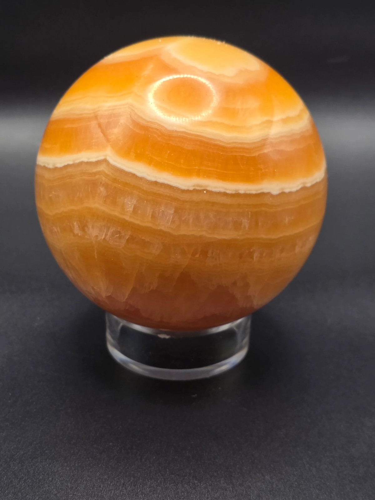 Large orange calcite sphere! 82.6mm, 3.2 inches, 1.12 pounds
