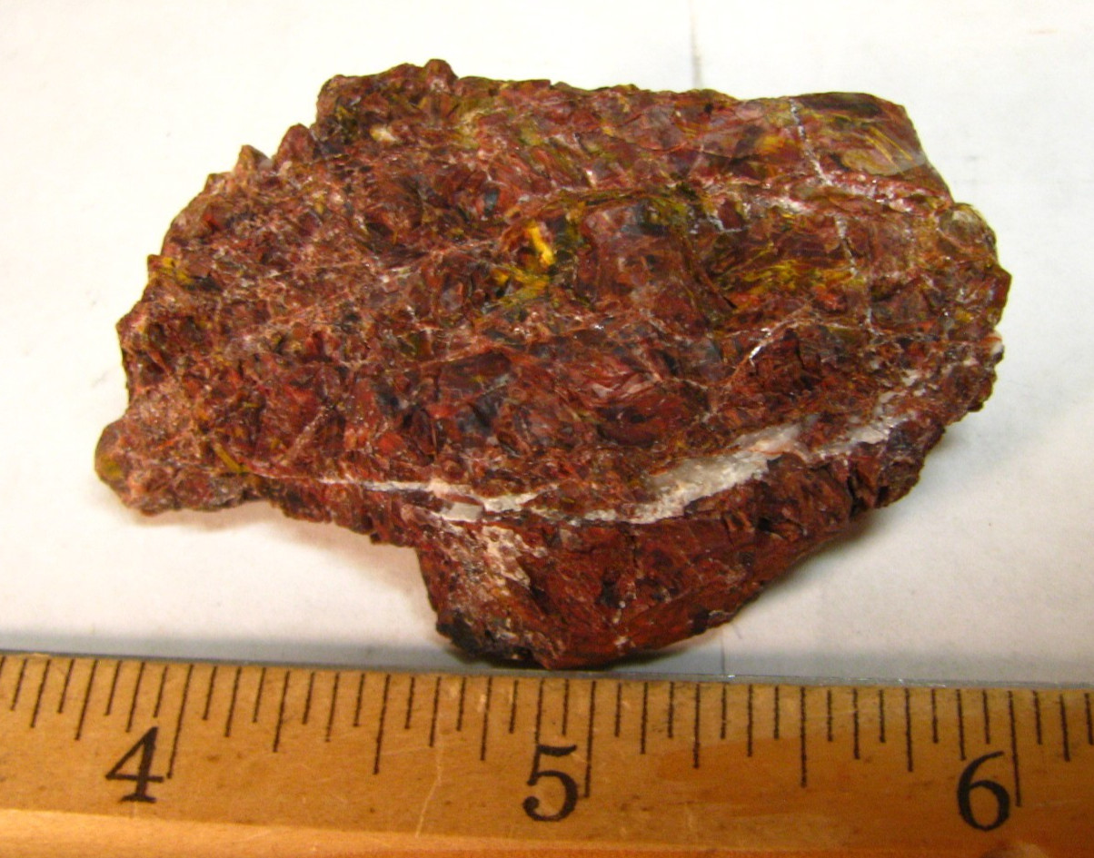 49g 2.4×1.6x.7inch RED PIETERSITE ROUGH W/YELLOW NAMIBIA #186