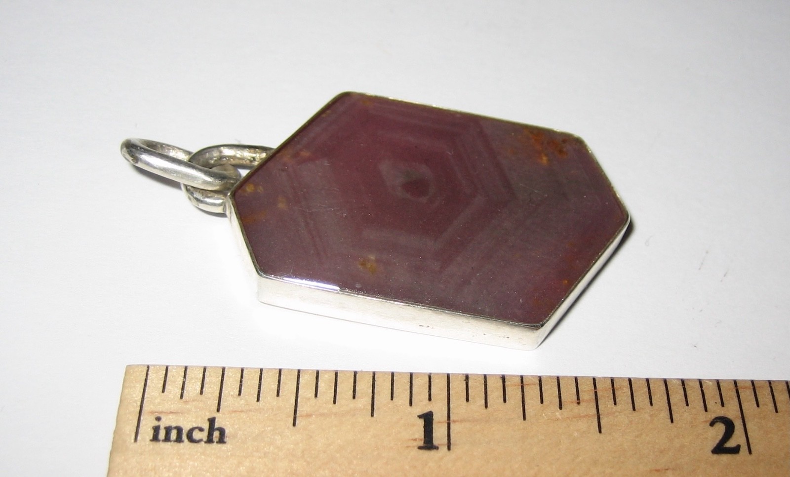36mm x 22mm RUBY CRYSTAL STONE MINERAL SILVER PENDANT TANZANIA W/ RESIN COATING