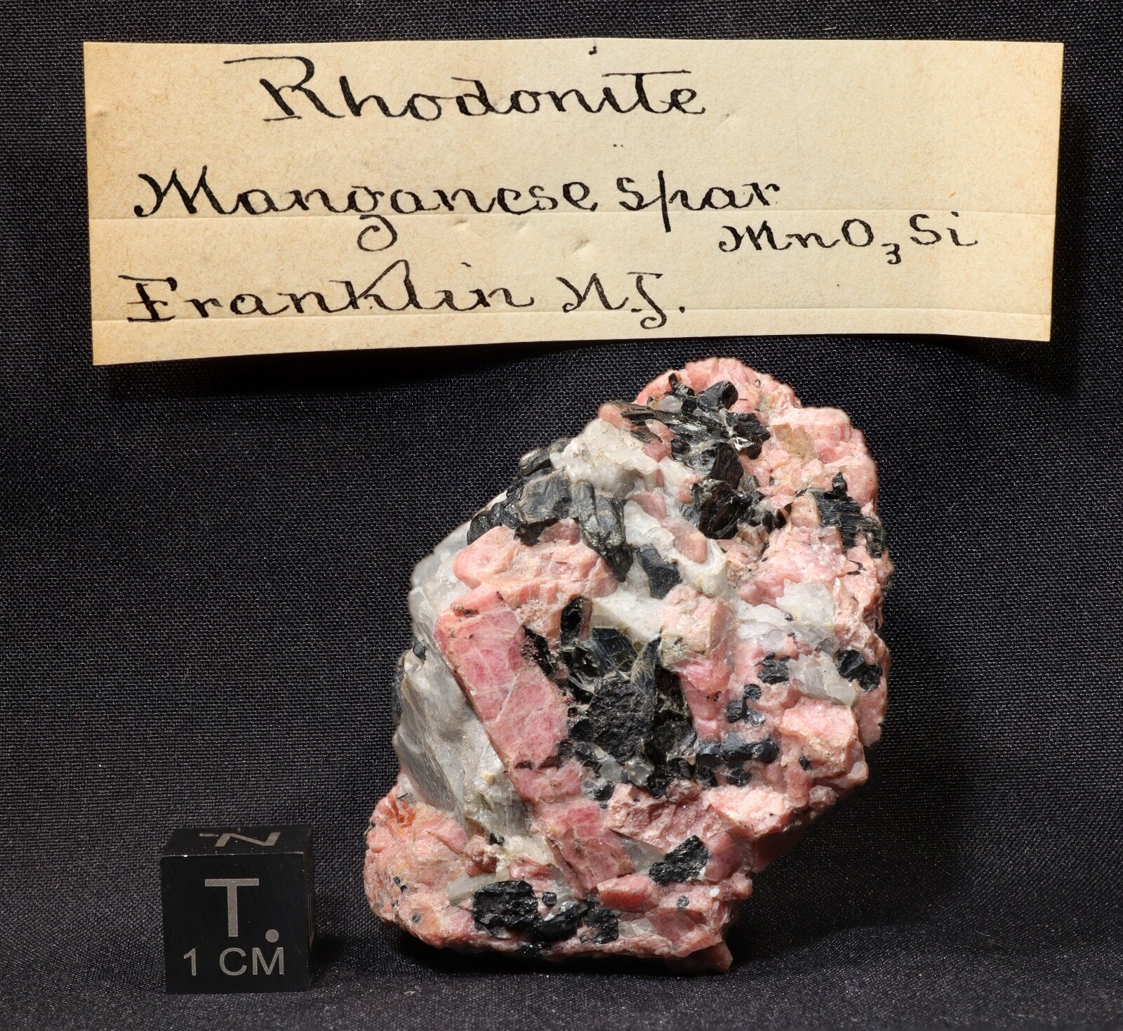 5 cm Rhodonite with Franklinite and Calcite from Franklin, New Jersey