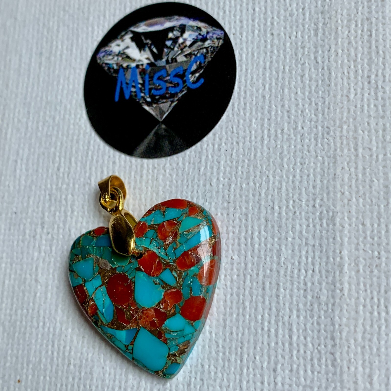 TURQUOISE AND CORAL HEART SHAPED PENDANT WITH GOLD PLATED BAIL