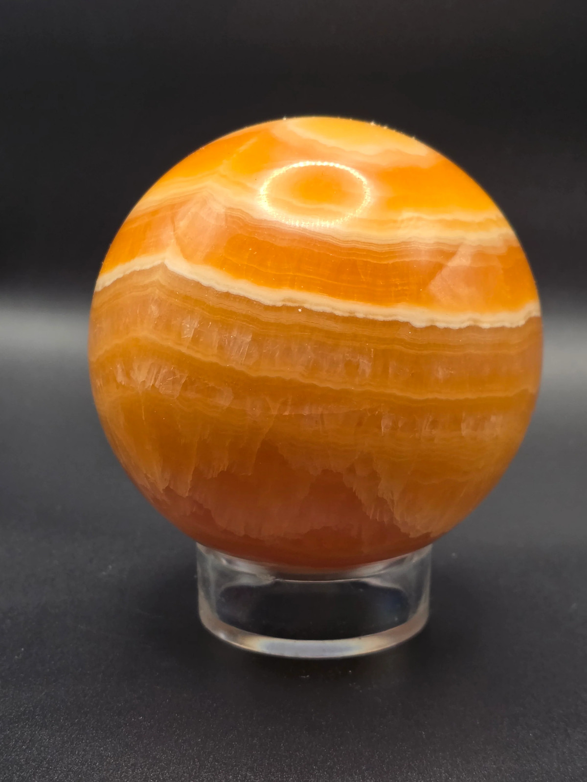 Large orange calcite sphere! 82.6mm, 3.2 inches, 1.12 pounds