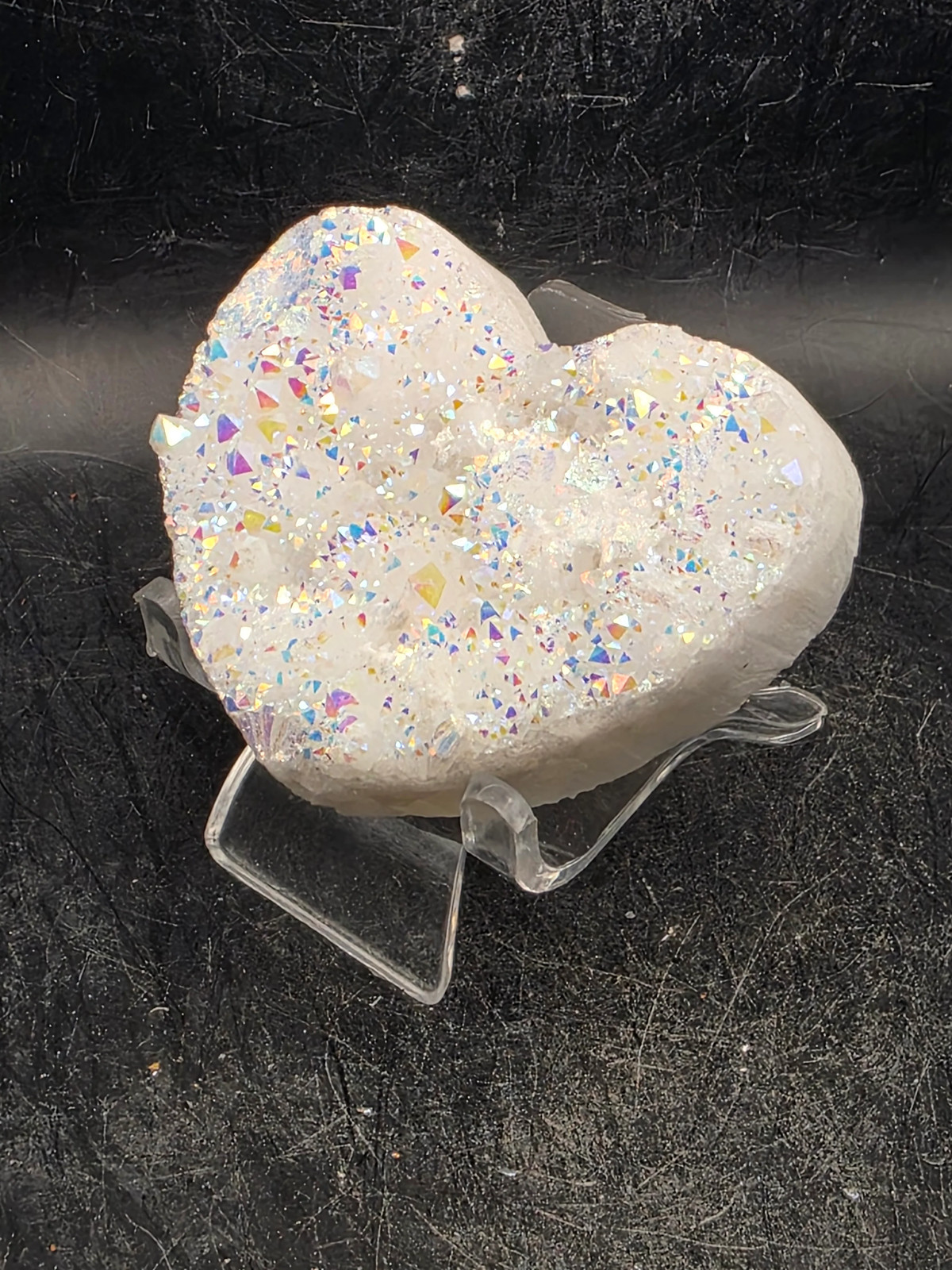 White pearl aura quartz heart! 3.4 ounces, 2.5 inches wide, 2.1″ tall