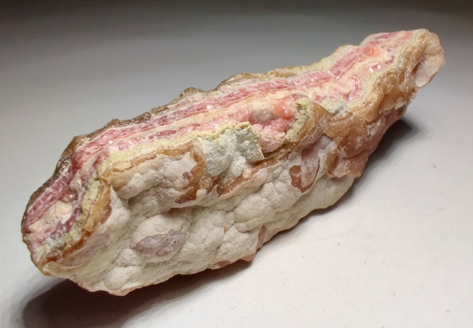 Rhodochrosite with crystals and banding. Capillitas, Argentina. 185 grams.