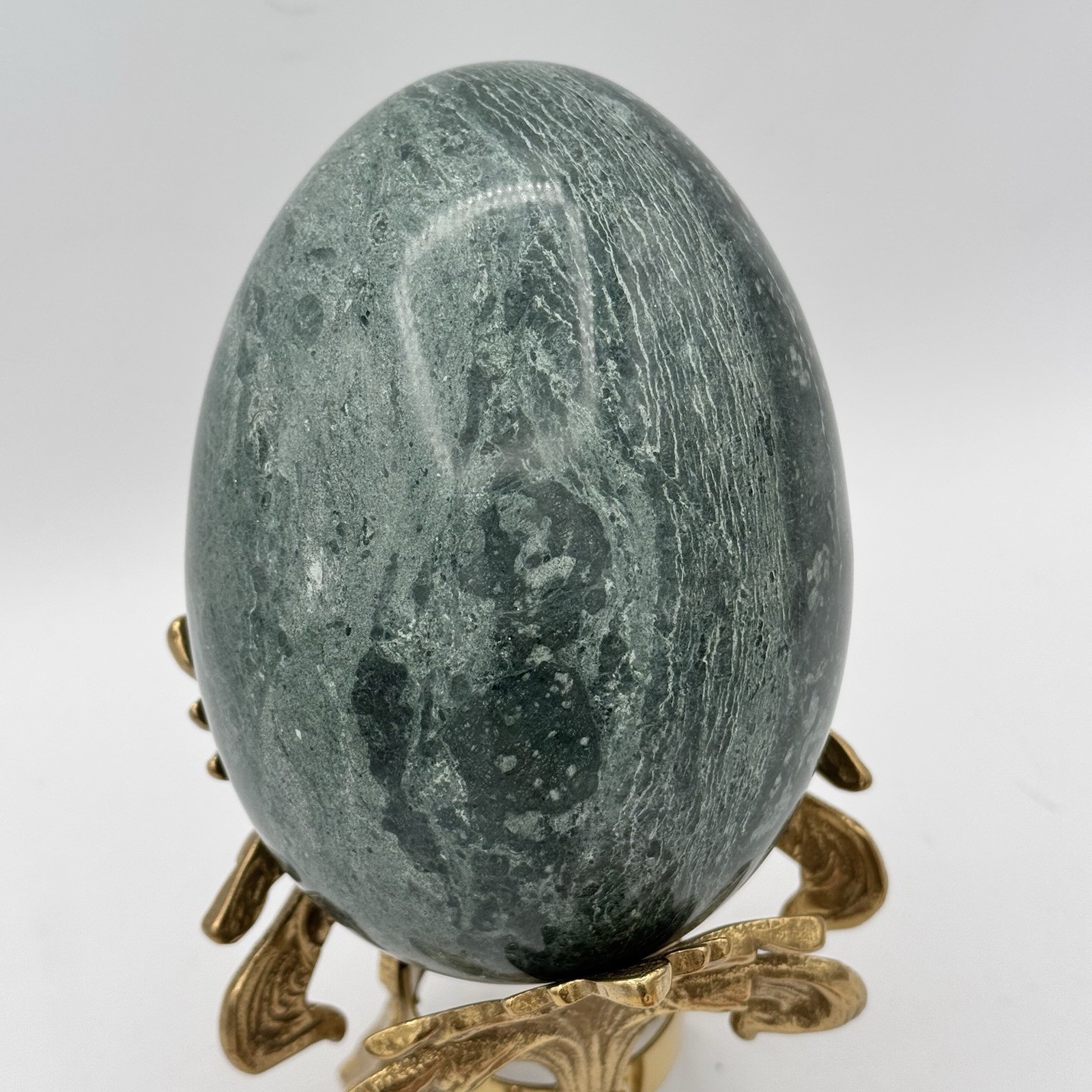 The Connoisseur Collection Teal Green Marble Egg On A Brass Fleur De Lis Base