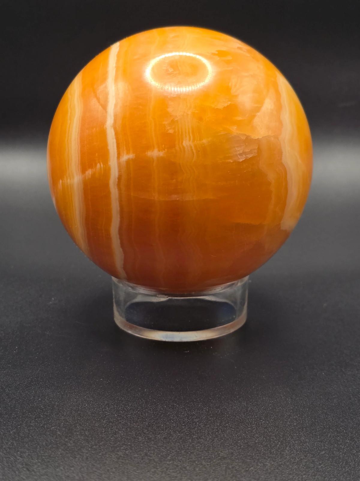Large orange calcite sphere! 82.6mm, 3.2 inches, 1.12 pounds