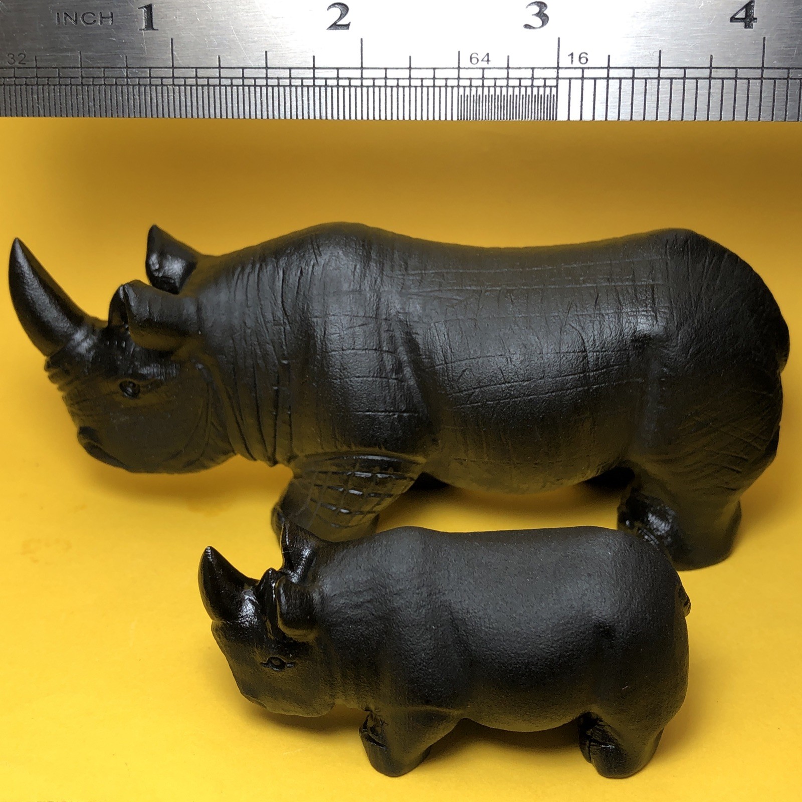 Top natural obsidian crystal quartz mineral label hand-carved rhinoceros family.