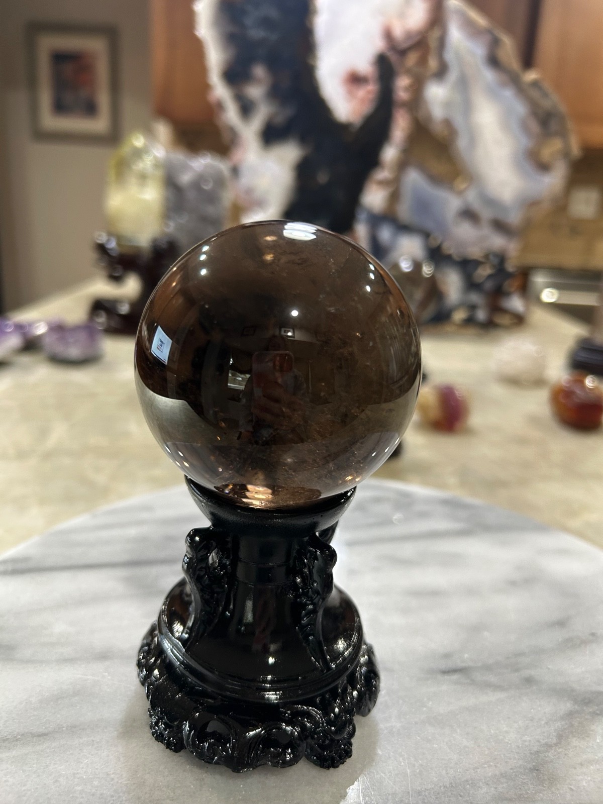 Smoky quartz sphere on resin stand 2.72”