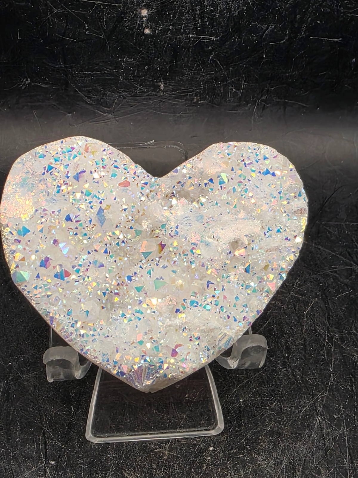 White pearl aura quartz heart! 3.4 ounces, 2.5 inches wide, 2.1″ tall