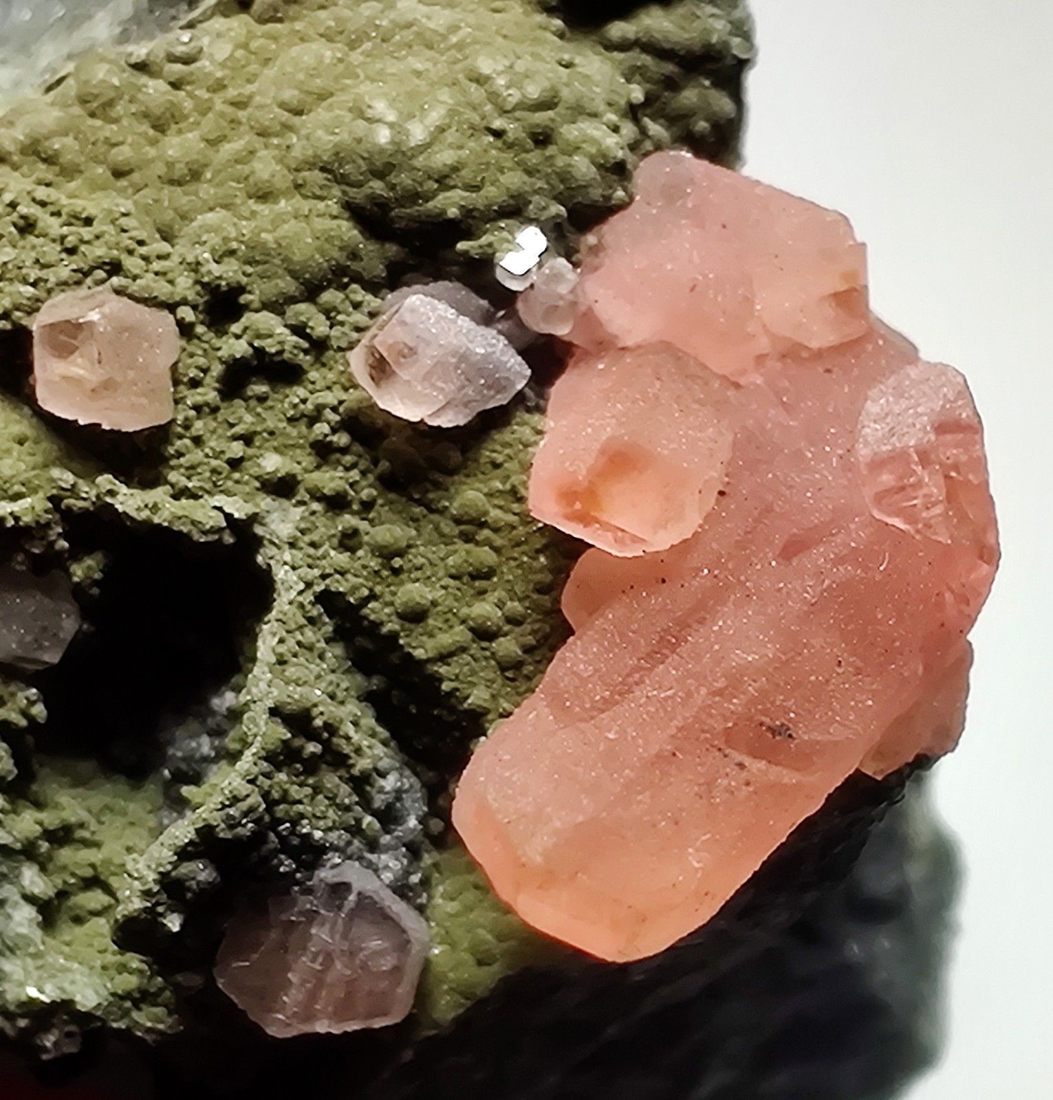 Rhodochrosite crystals on matrix. Uchucchacua Mine, Lima, peru. 14 grams.