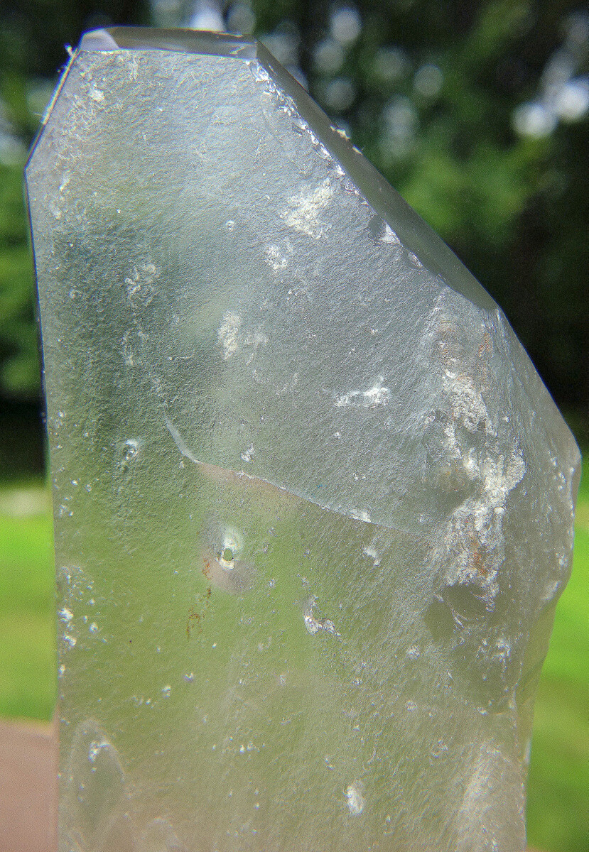 Included Quartz Crystal with Rainbows Natural and Polished Surfaces
