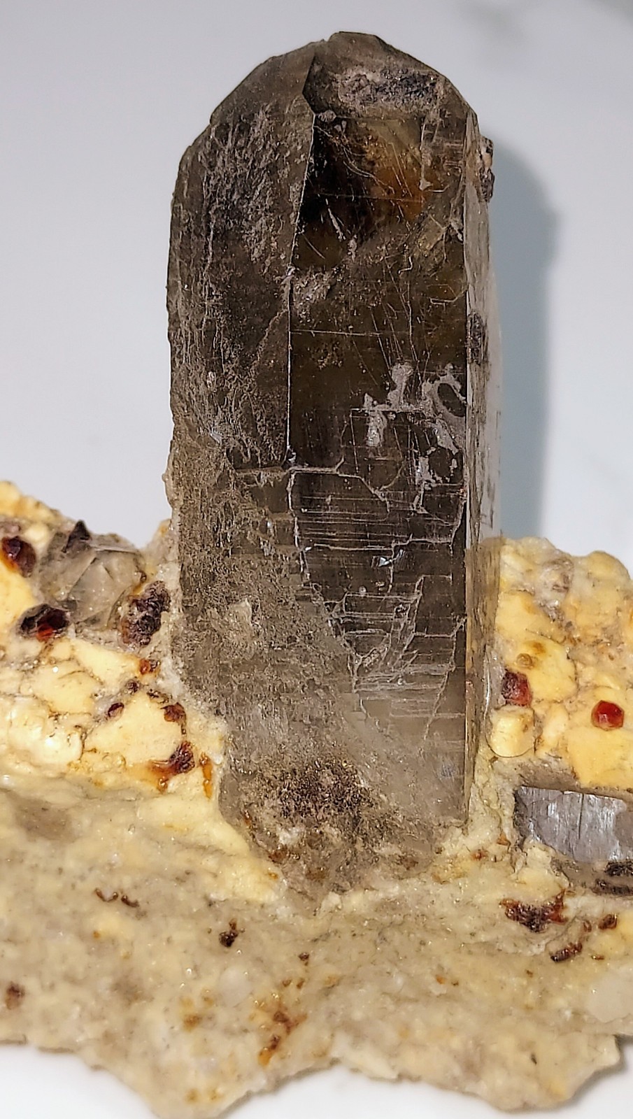 Spesserite Garnet With Smoky Quartz In Muscovite