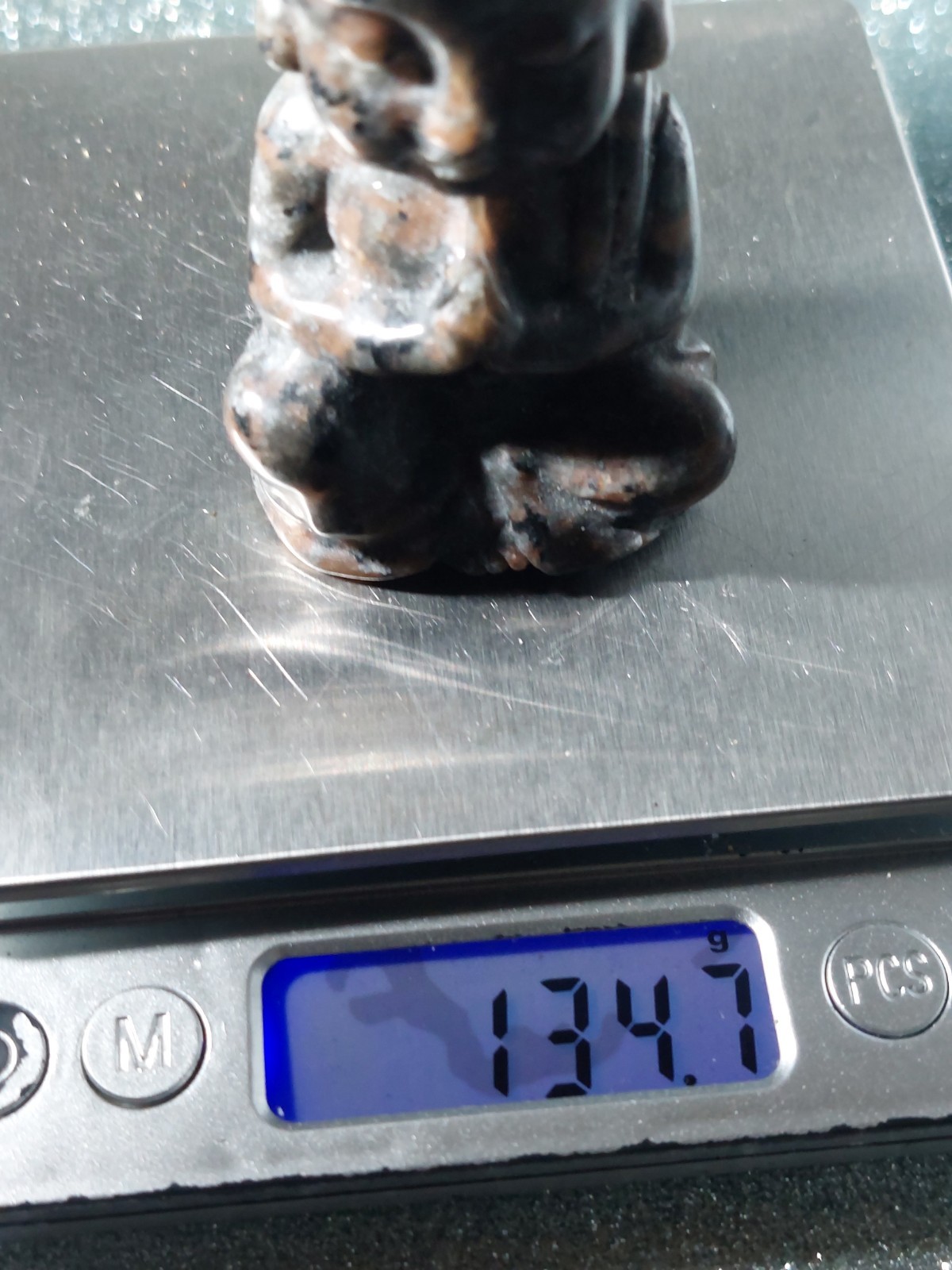 Yooperlite Buddha Carving 134.7g 8cm UV Reactive – Glows Orange Under Light
