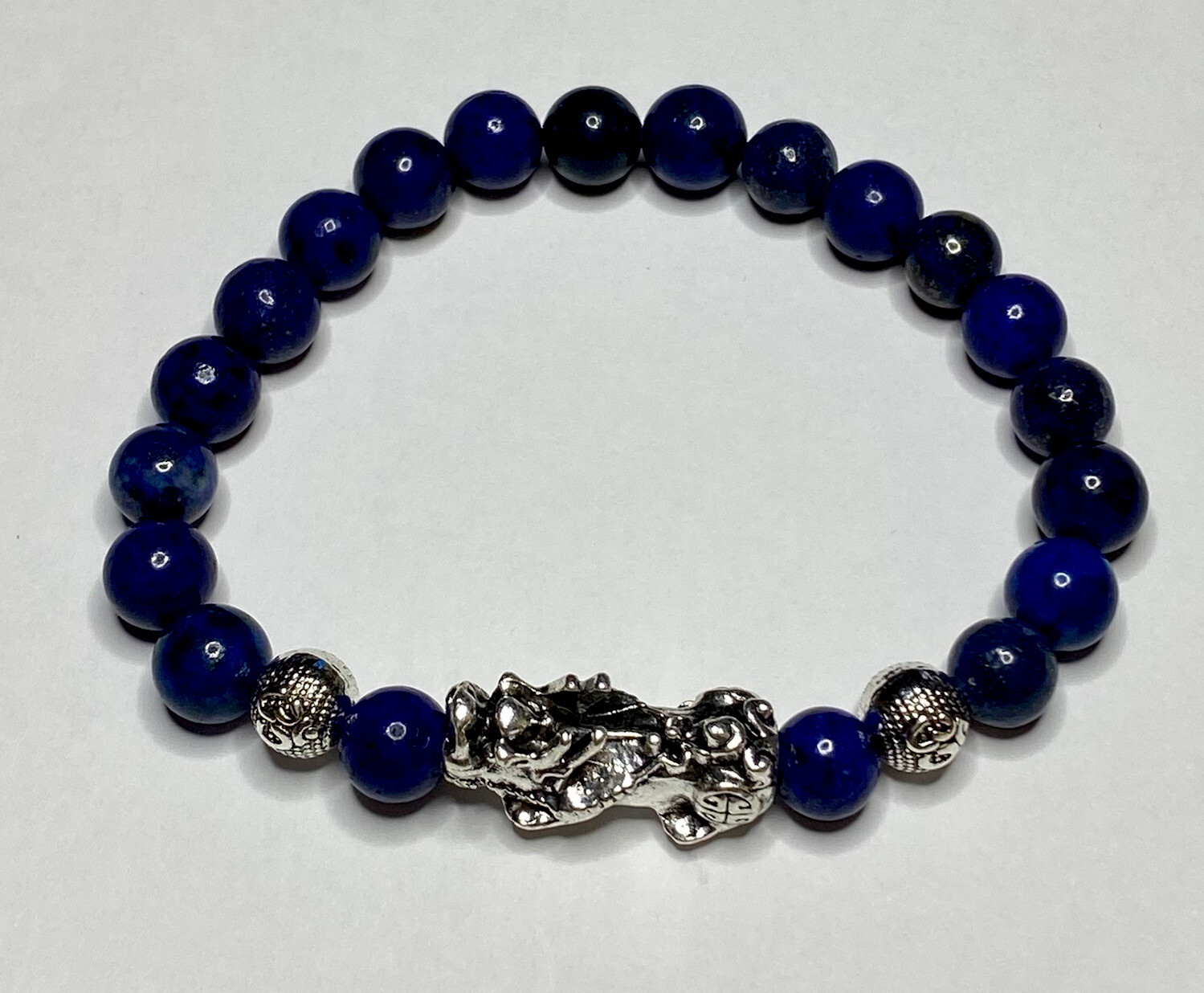 8” Natural Lapislázuli Unisex Bracelet. 8mm Silver Alloy Pi Xiu And OM Symbol