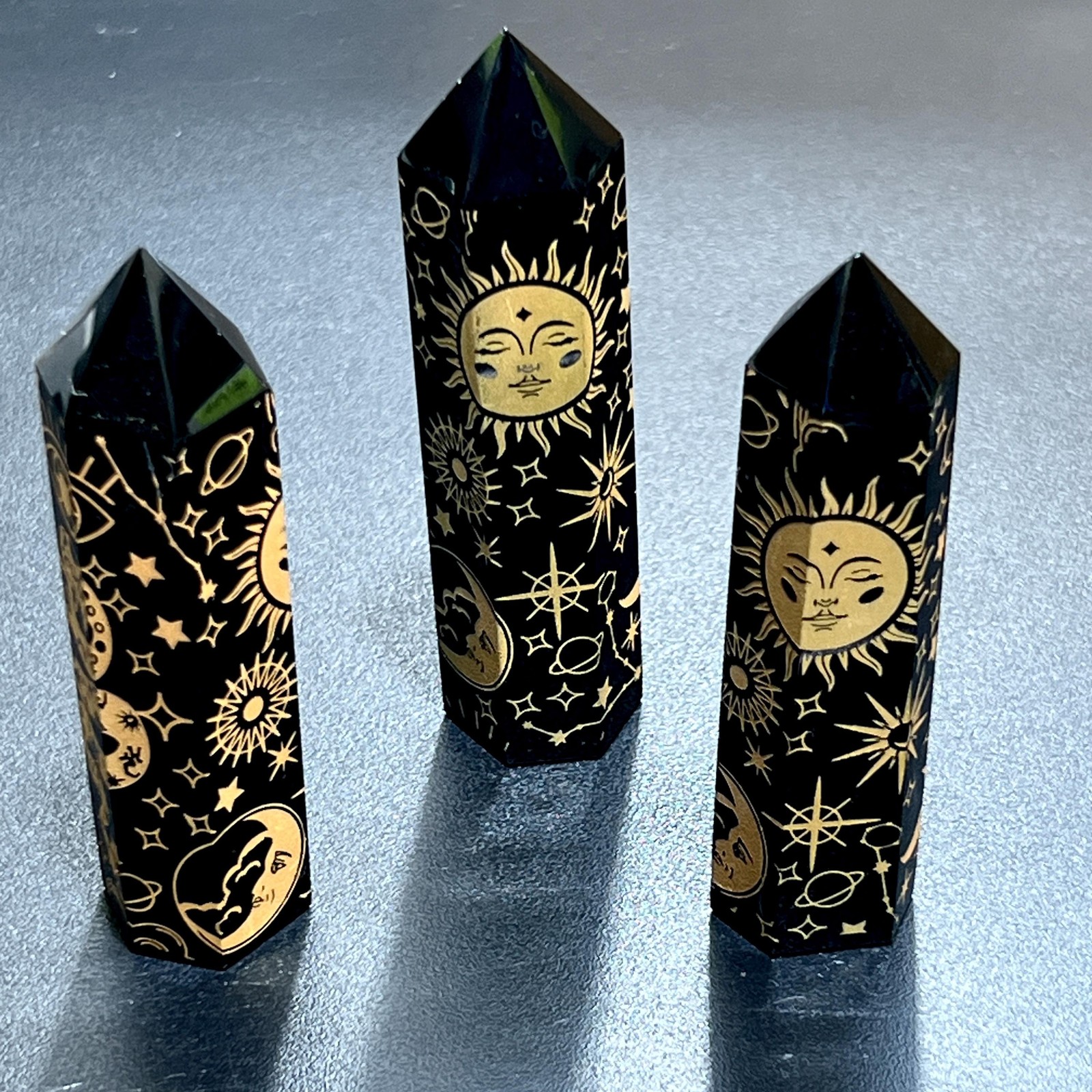 Black Obsidian Point Tower Carving With Gold Sun Moon Decals