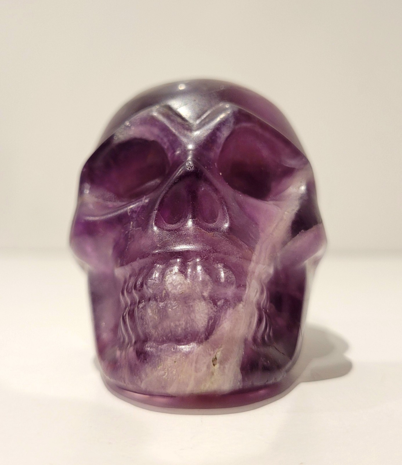 Purple Flourite Human Skull Carving Natural Crystal UV Reactive 439.8g, 0.9lbs