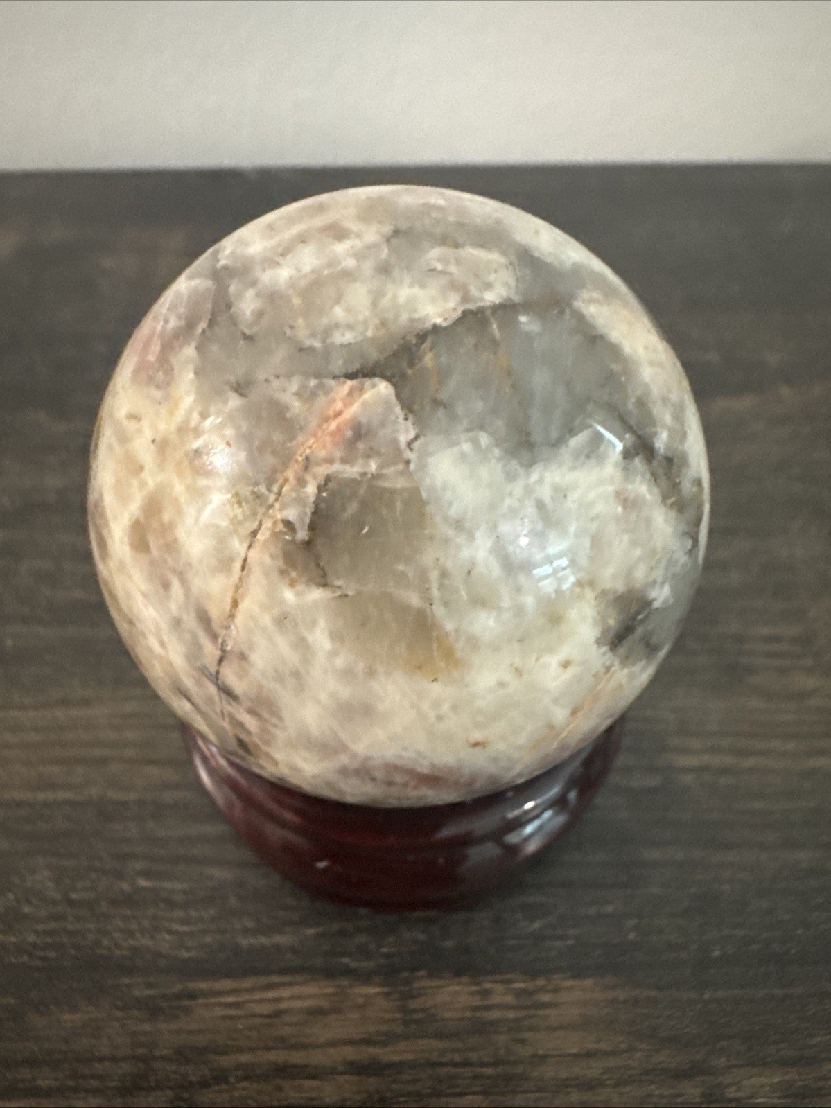 Sunstone Crystal Sphere 196 Grams 52 mm Flashy