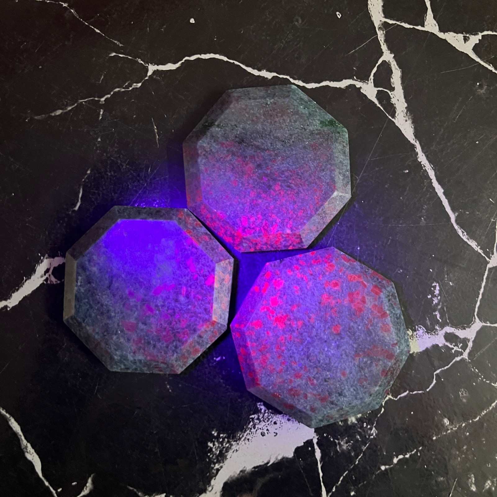 Ruby Kyanite Palm Stone UV Reactive Fluorescent Crystal Octagon 48mm