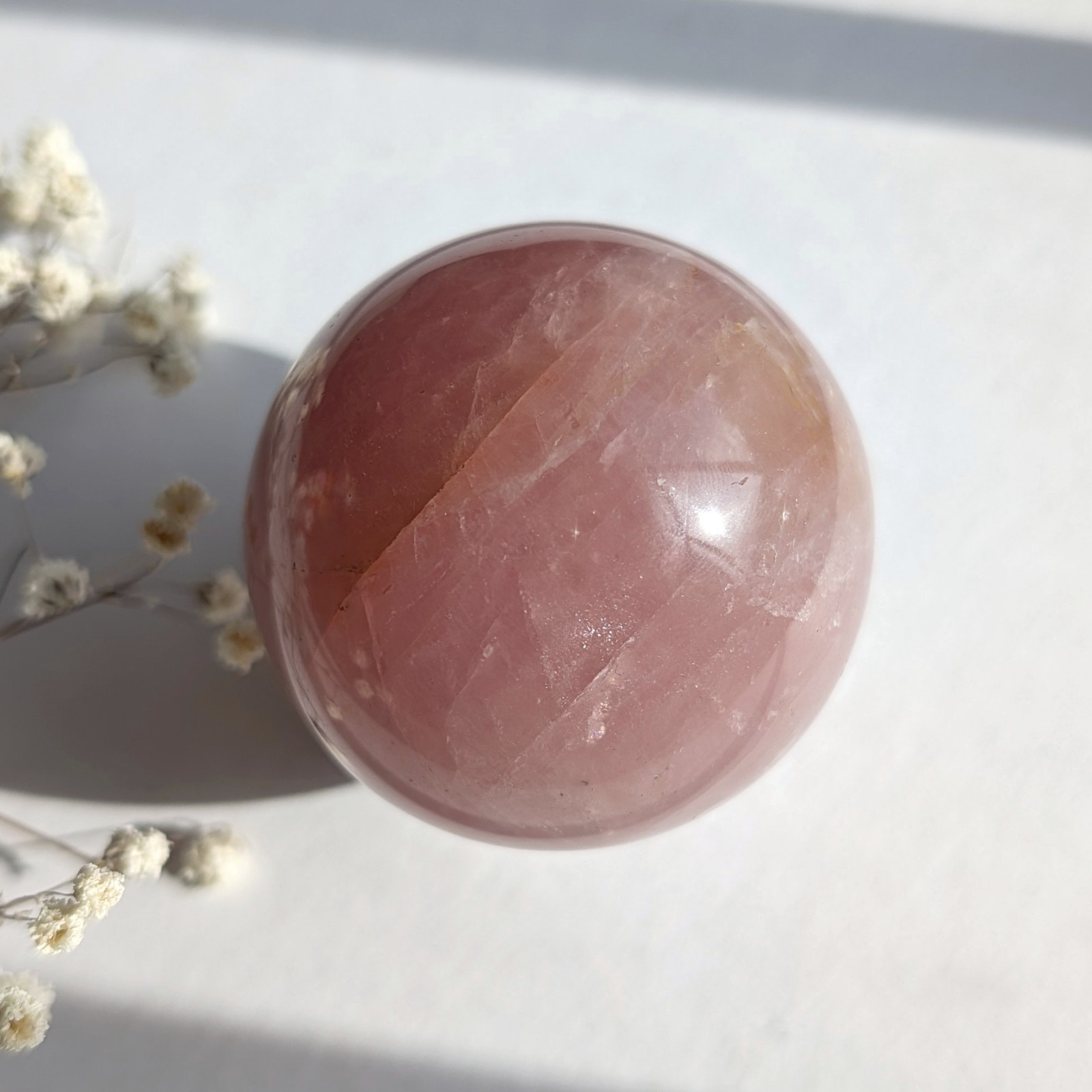52mm bubblegum rose quartz crystal sphere, saturated & shimmery, pink crystal