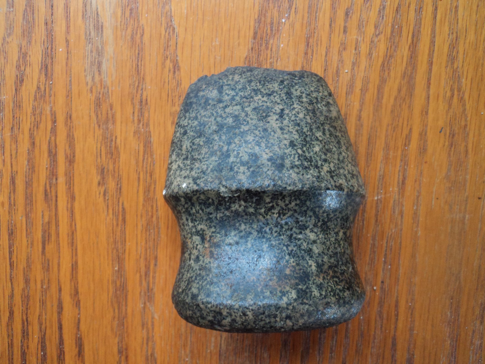 1 Fully groved polished green granite axe 4in by 3in by 2in
