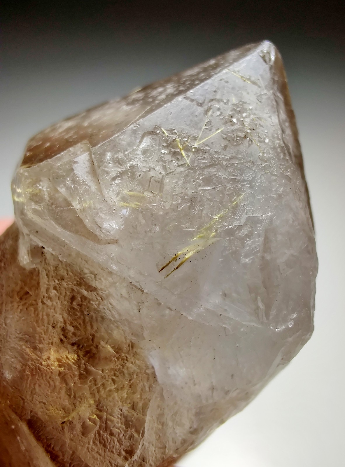 Terminated Quartz crystal with golden Rutile inclusions. Brazil. 35 grams.