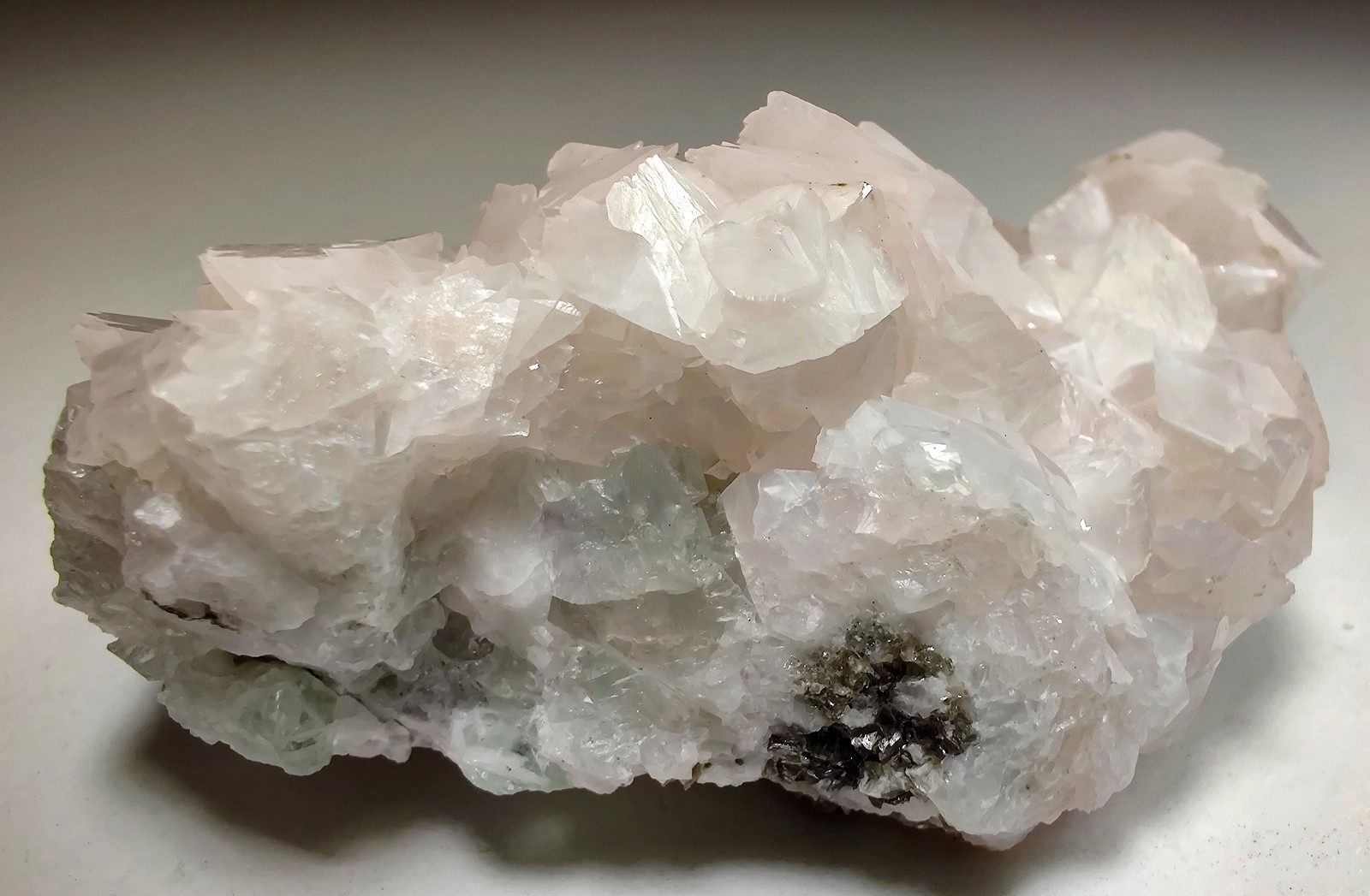 Excellent Calcite crystals with Fluorite, UV. Yaogangxian Mine, China. 57 grams.