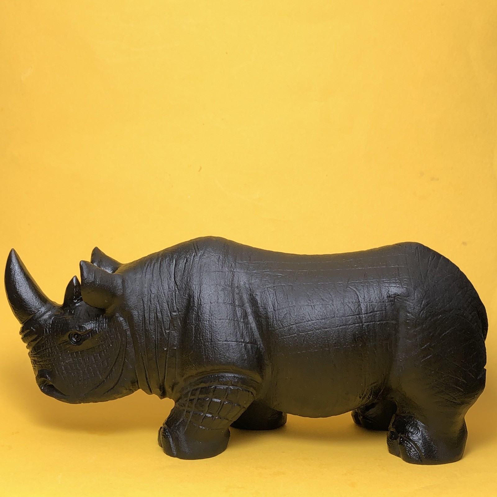Top natural obsidian crystal quartz mineral label hand-carved rhinoceros family.