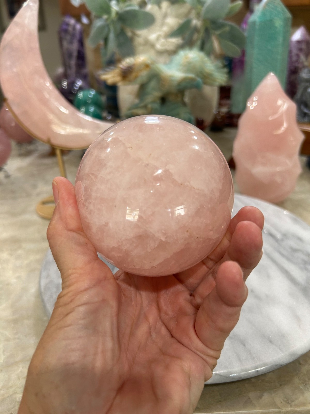 Rose Quartz sphere with resin stand 3.60”