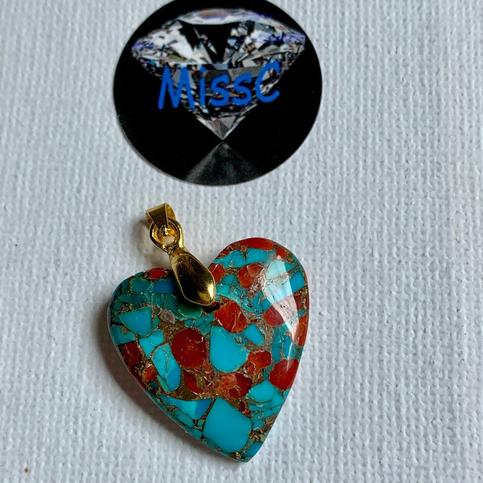 TURQUOISE AND CORAL HEART SHAPED PENDANT WITH GOLD PLATED BAIL