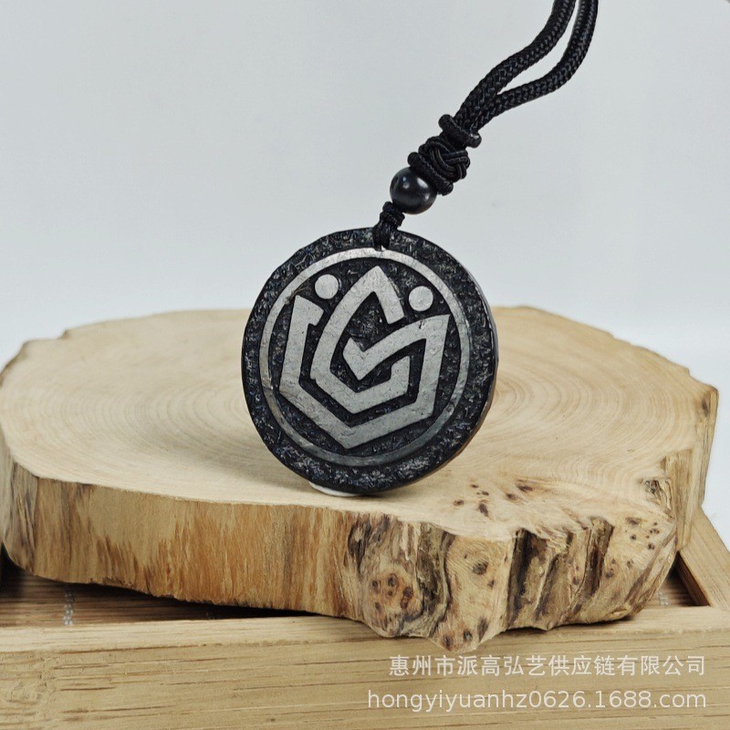 Shungite black natural stone circular pendant carved with retro totem pendant