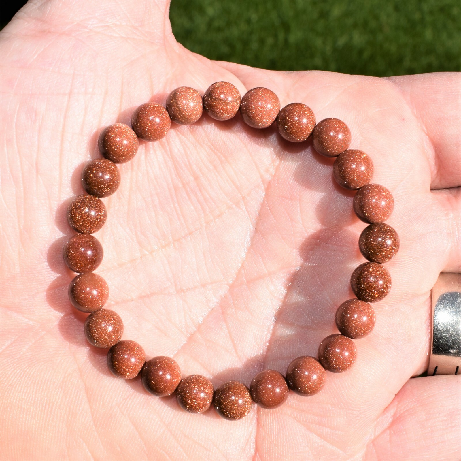 CHARGED Red Goldstone Stretchy 8mm Bead Bracelet + Baby Selenite Puffy Heart