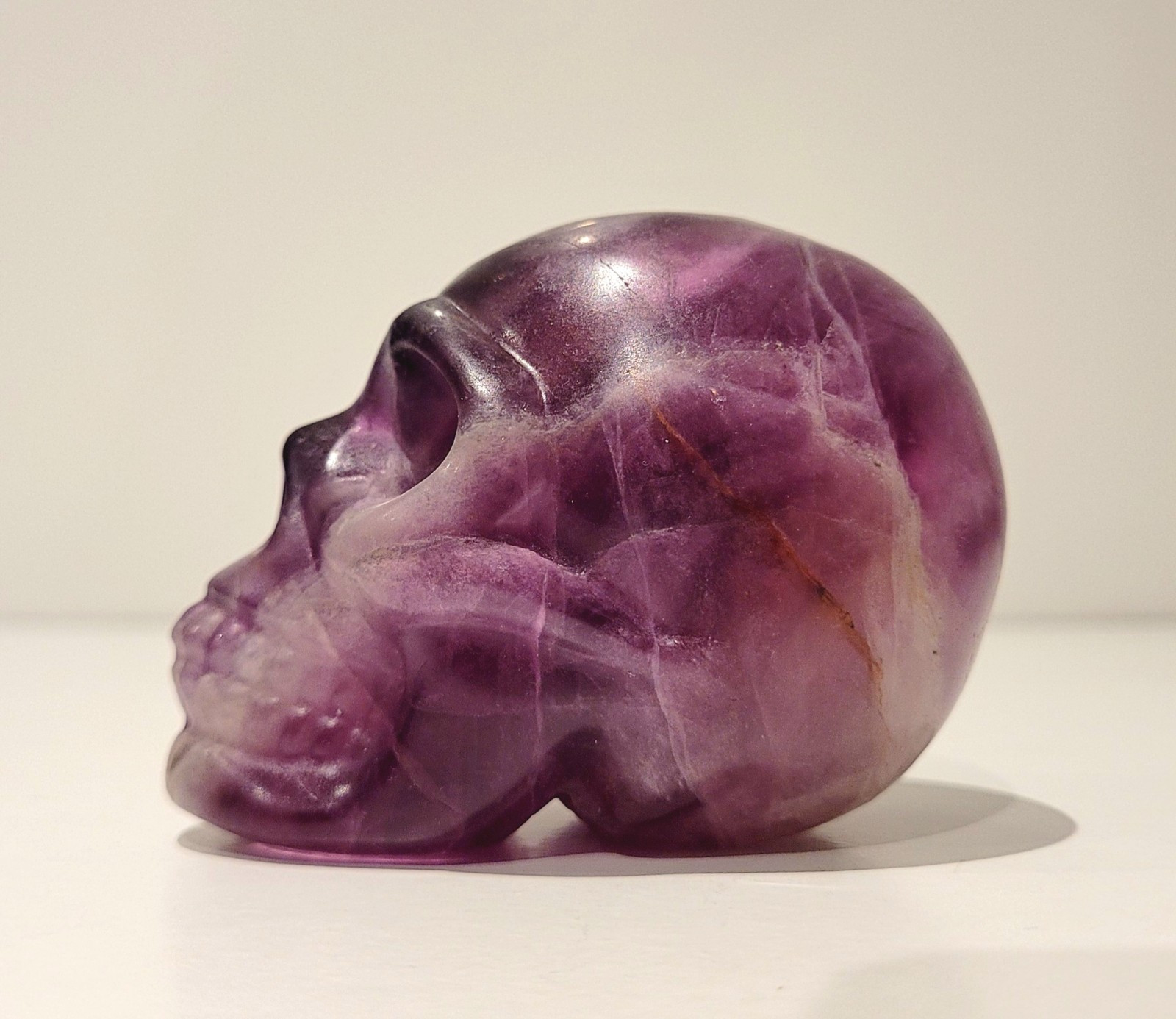 Purple Flourite Human Skull Carving Natural Crystal UV Reactive 439.8g, 0.9lbs