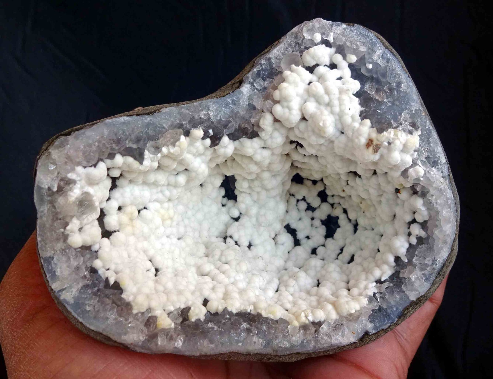 SUPERB OKENITE CLUSTERS IN AMETHYST MATRIX GEODE BASE # 504