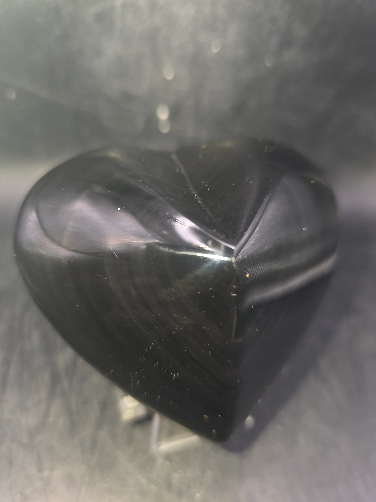 Rainbow obsidian heart! 10 ounces, 3 inches wide, 2.8″ tall