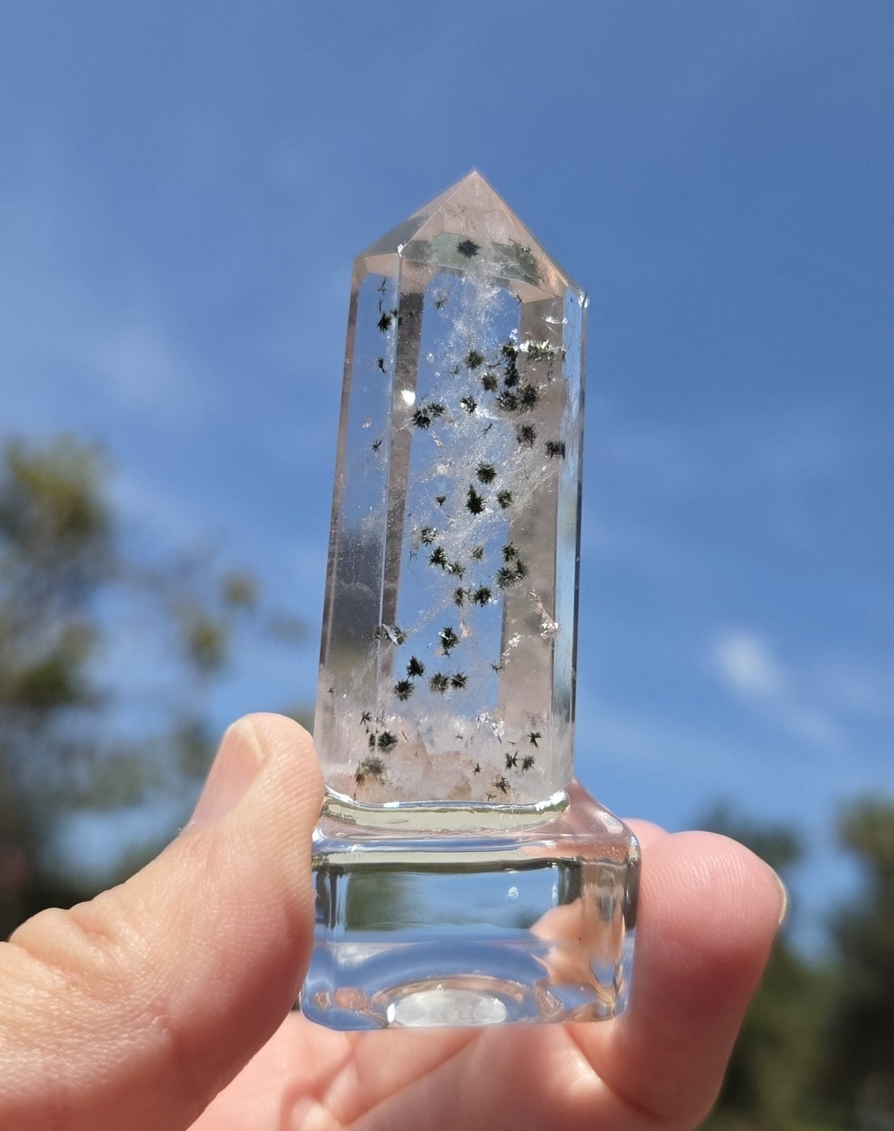 Star Hollandite Quartz point W/Clear Glass Stand