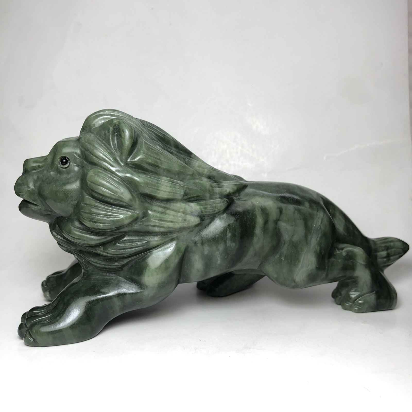 Lion hand-carved natural Dushan jade crystal quartz mineral specimen collection.