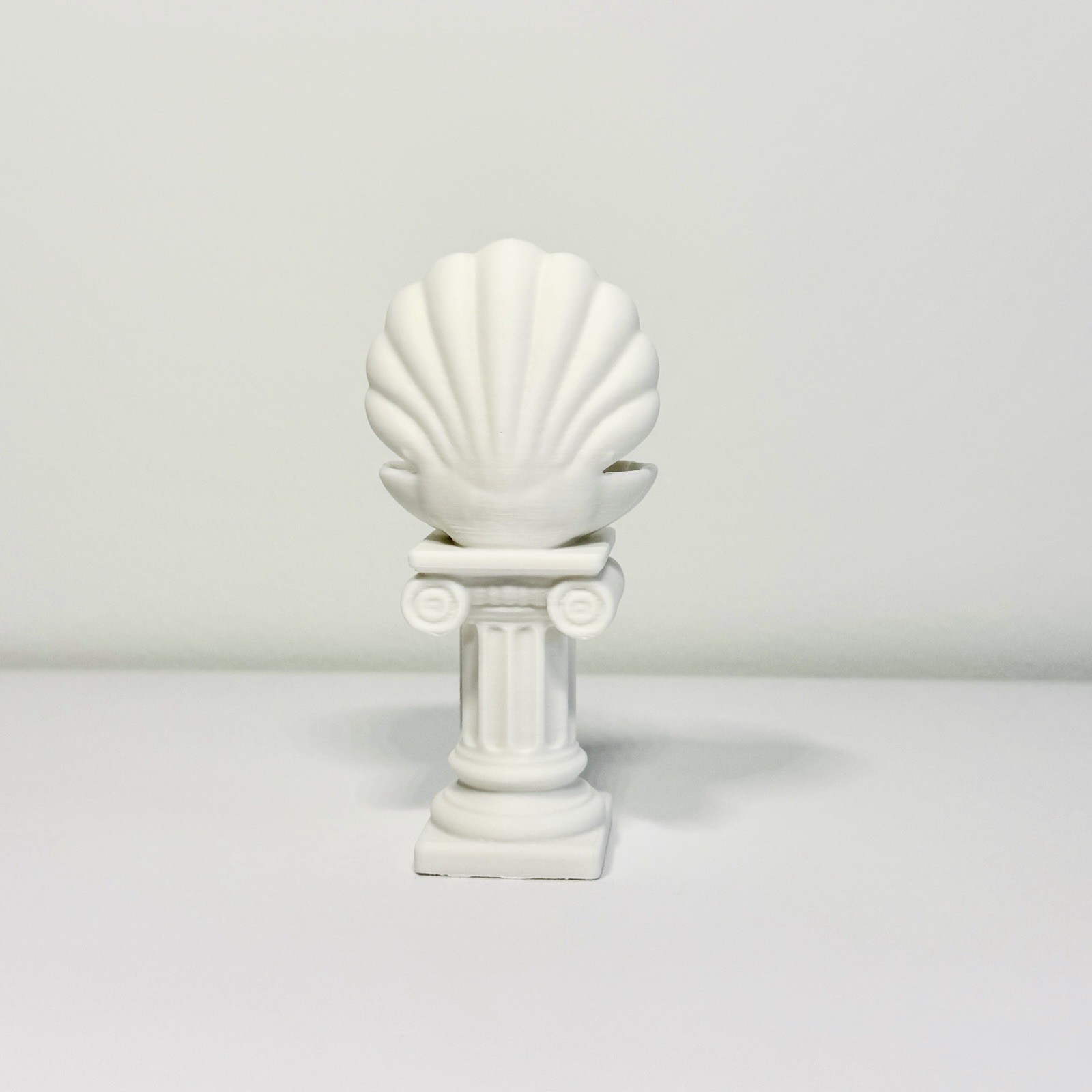 Venus Shell Pedestal Palm Stone Holder with Included Green Opal Crystal
